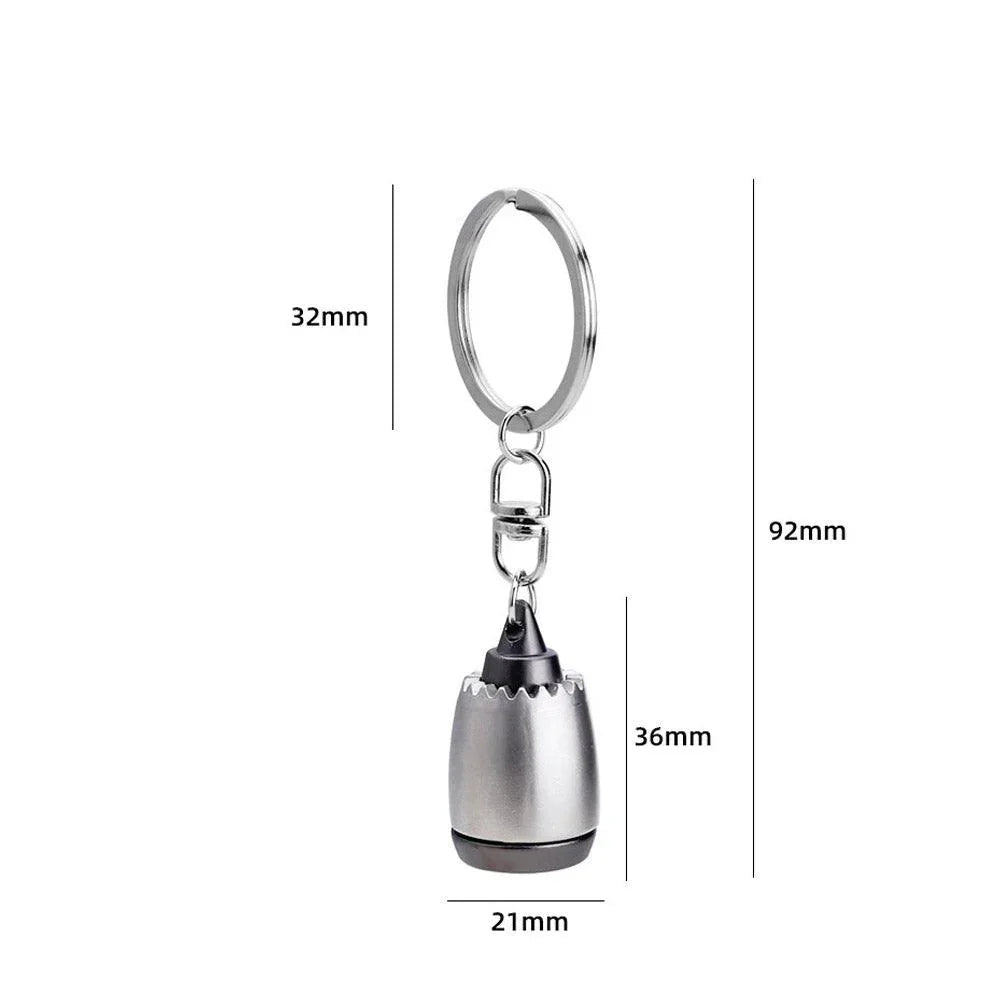 Silver keychain with dimensions labeled on a white background