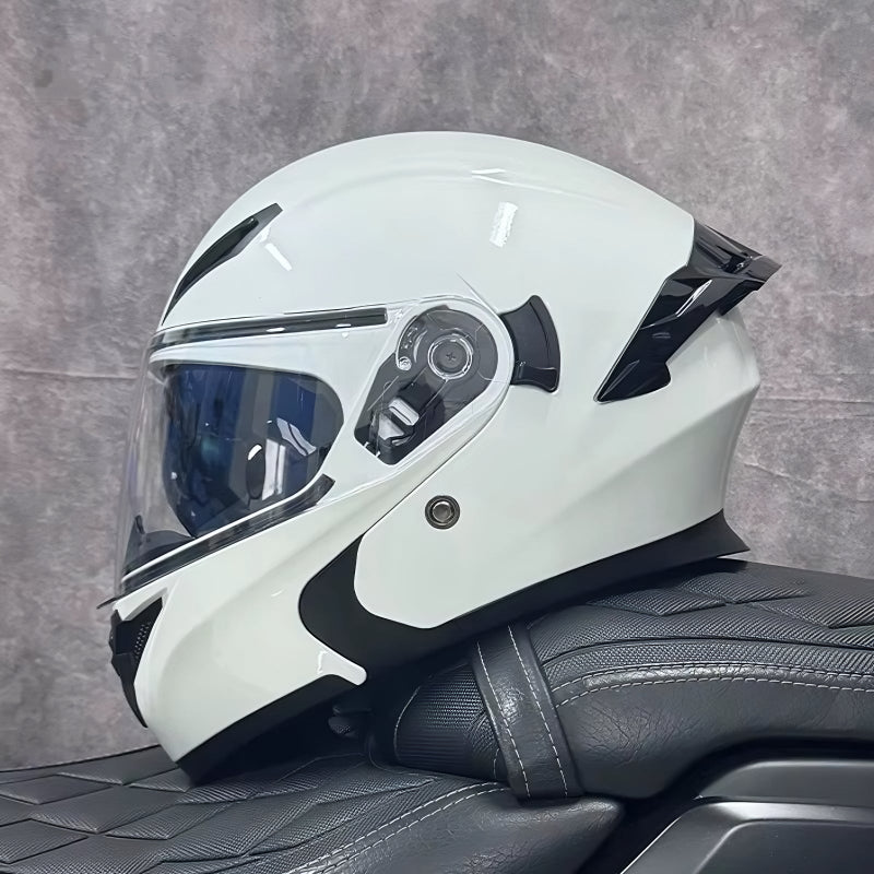 White motorcycle helmet with black accents on a textured gray background