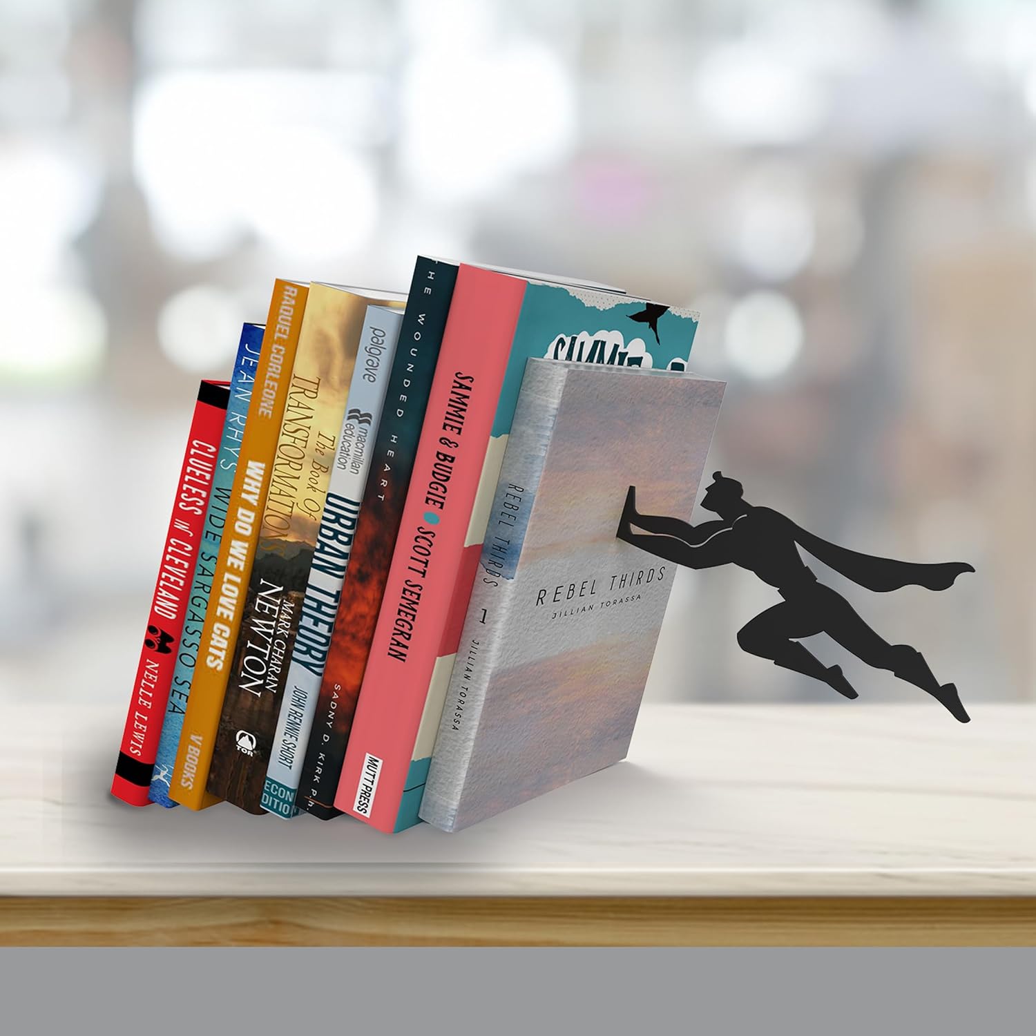 Premium metal bookend stand with heroic character silhouette design for book organization and display - Superman