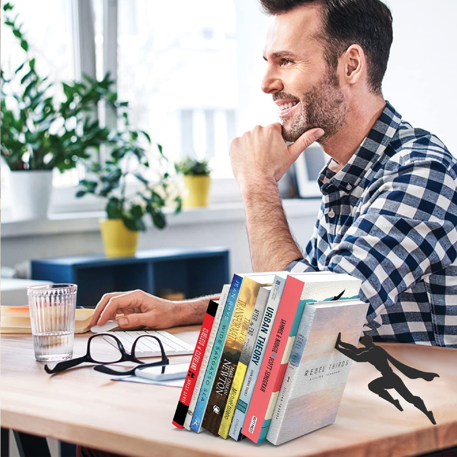 Premium metal bookend stand with heroic character silhouette design for book organization and display - Superman