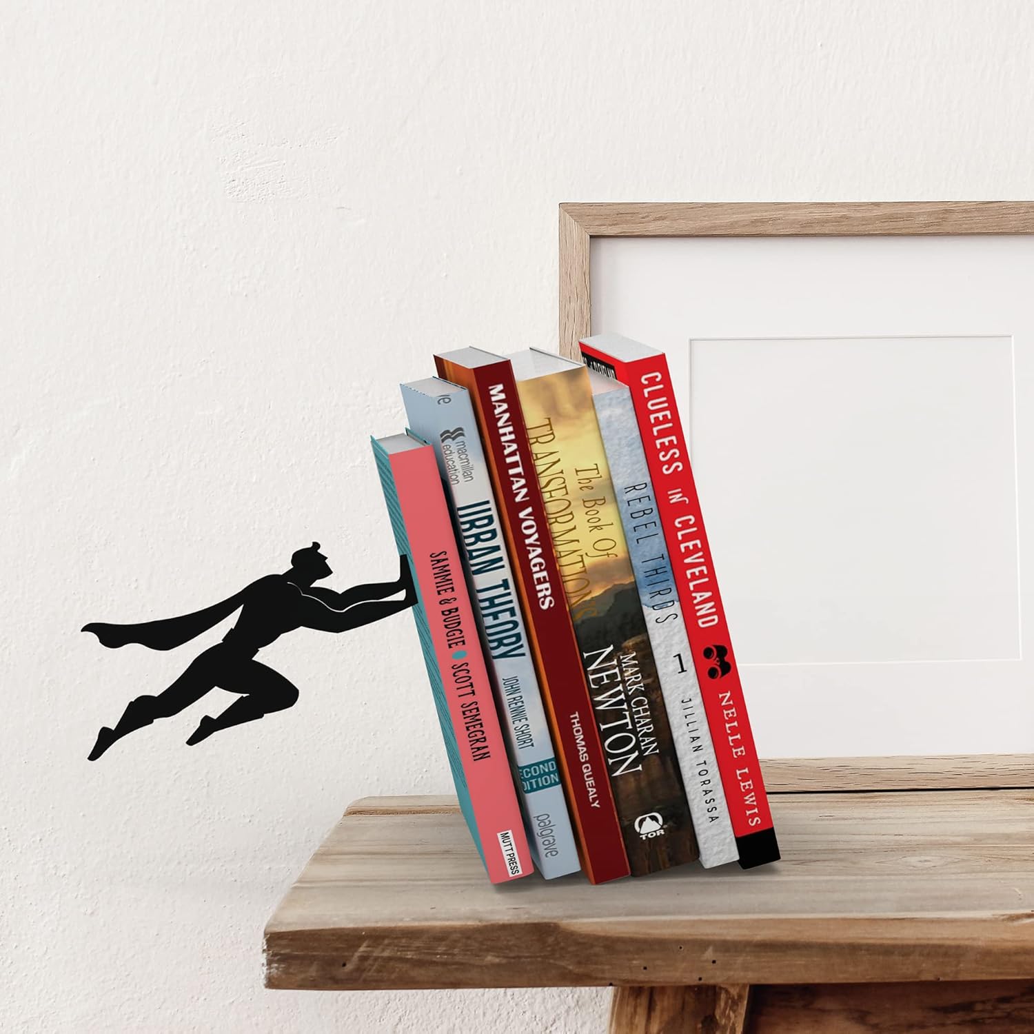 Premium metal bookend stand with heroic character silhouette design for book organization and display - Superman