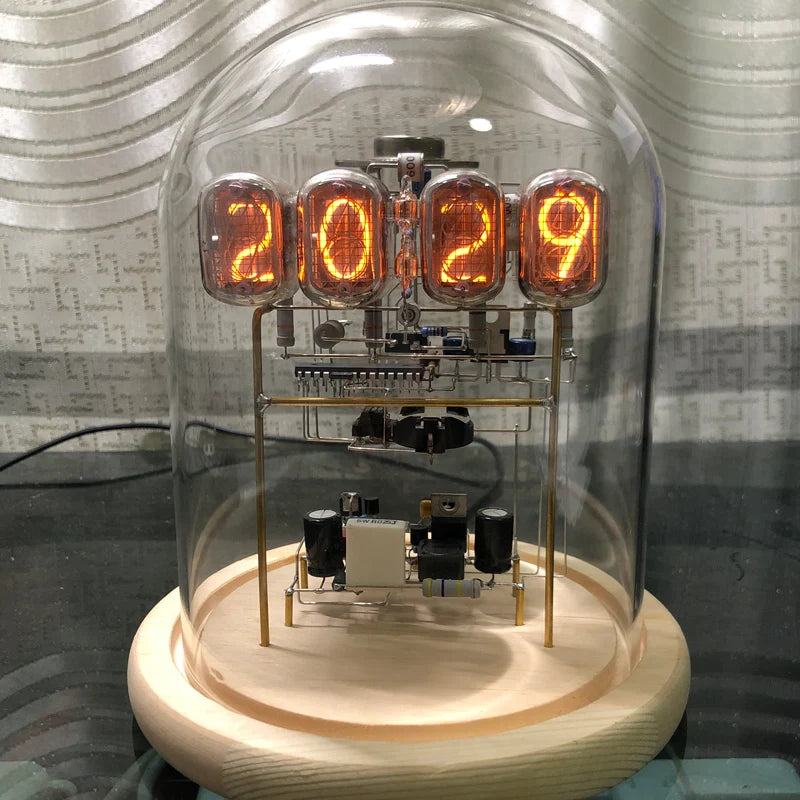 Vintage nixie tube clock with glowing amber display and wooden base from Puzzloria