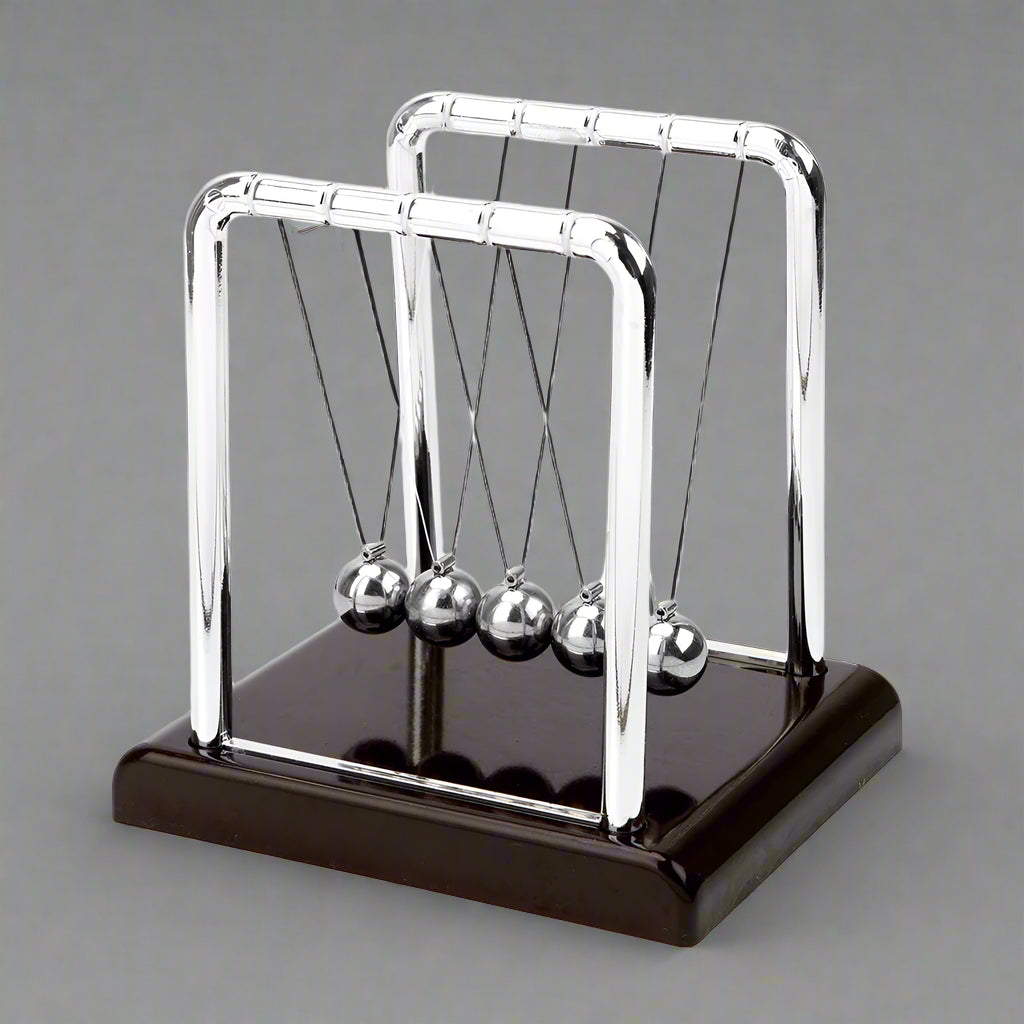 Newton's Cradle physics pendulum desk toy with steel balls demonstrating momentum and energy laws