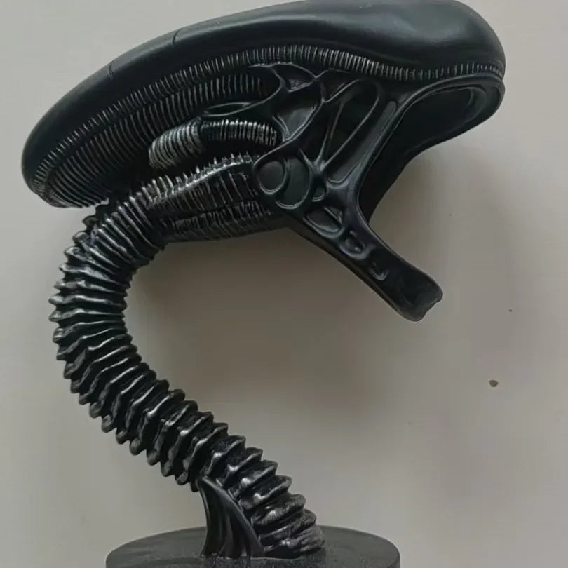 Black alien head with a long neck on a white background -Unique alien creature resin lamp stand for modern home decor
