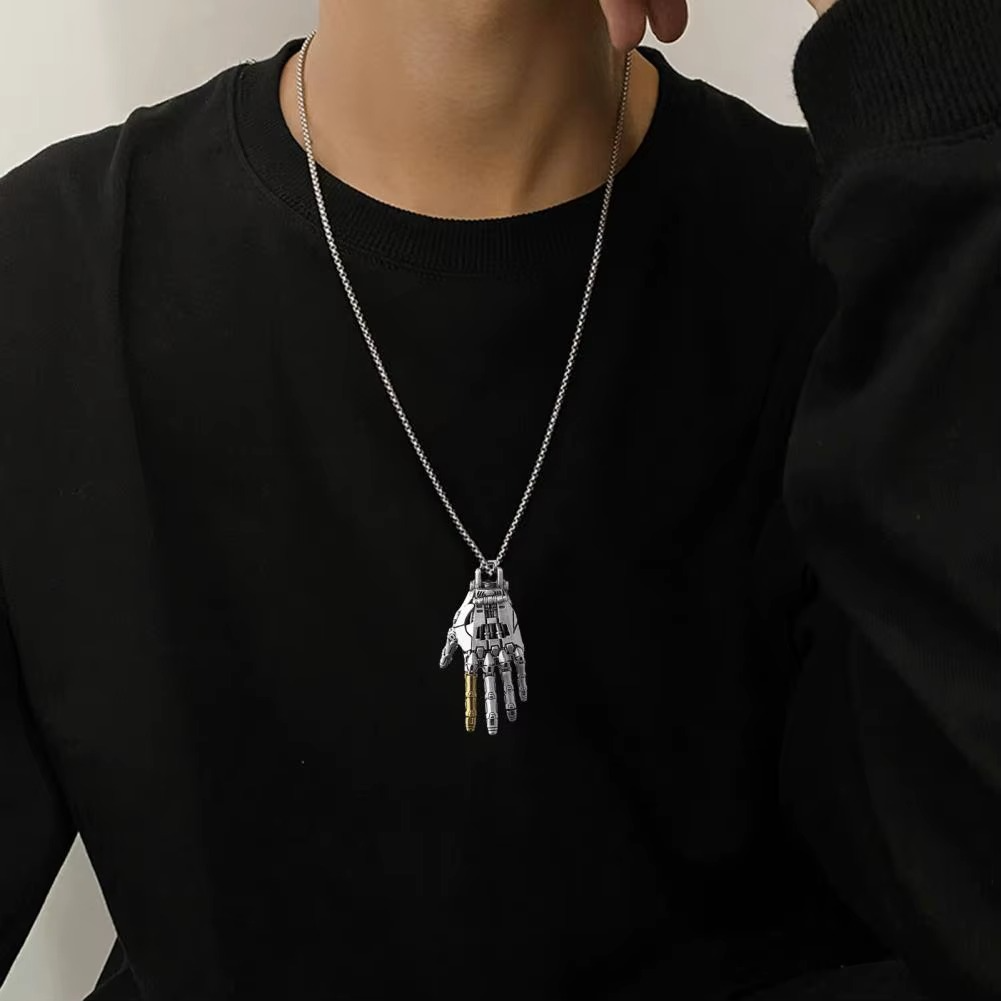 Puzzloria cybernetic hand pendant with articulated joints and steampunk design