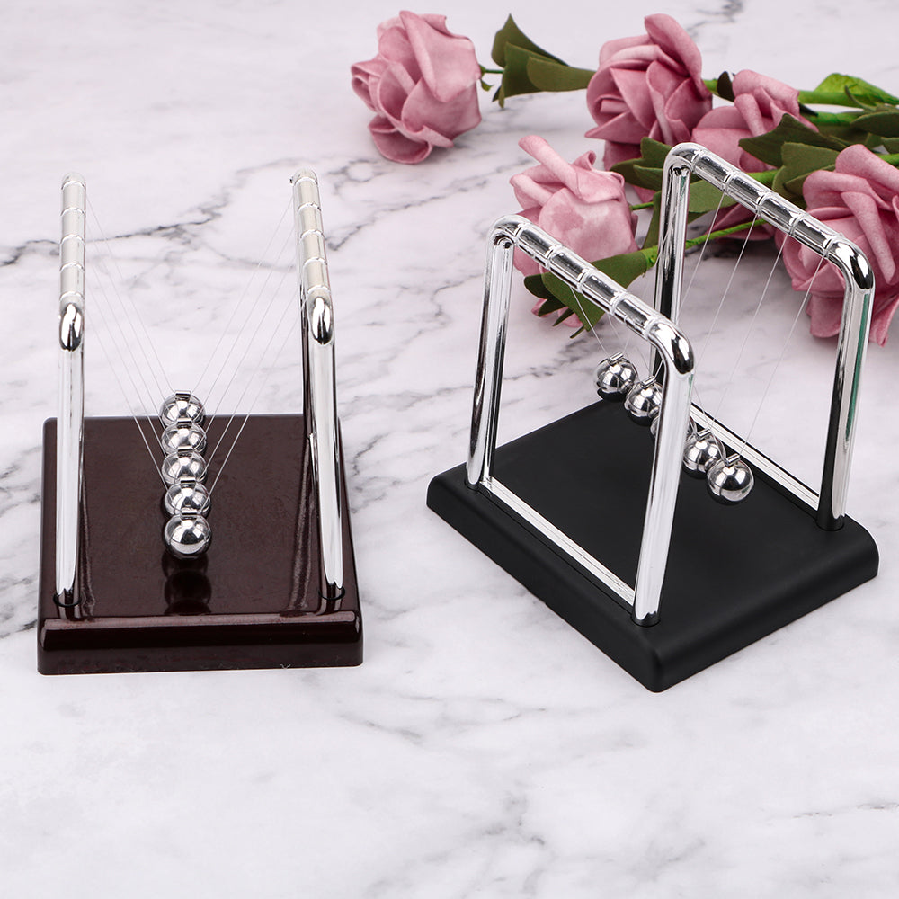 Newton's Cradle physics pendulum desk toy with steel balls demonstrating momentum and energy laws