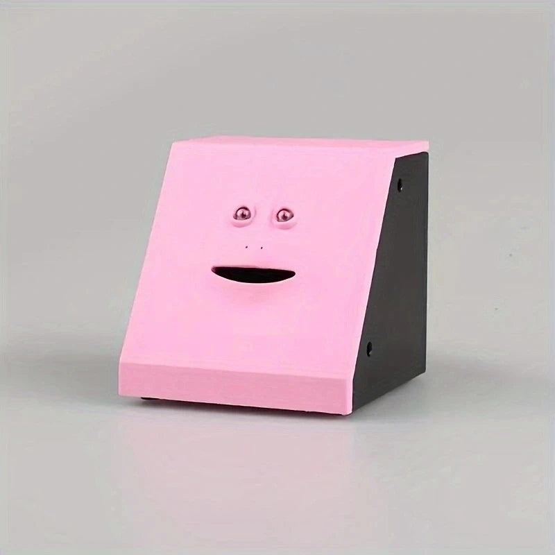 Pink and black box with a face design on a gray background
