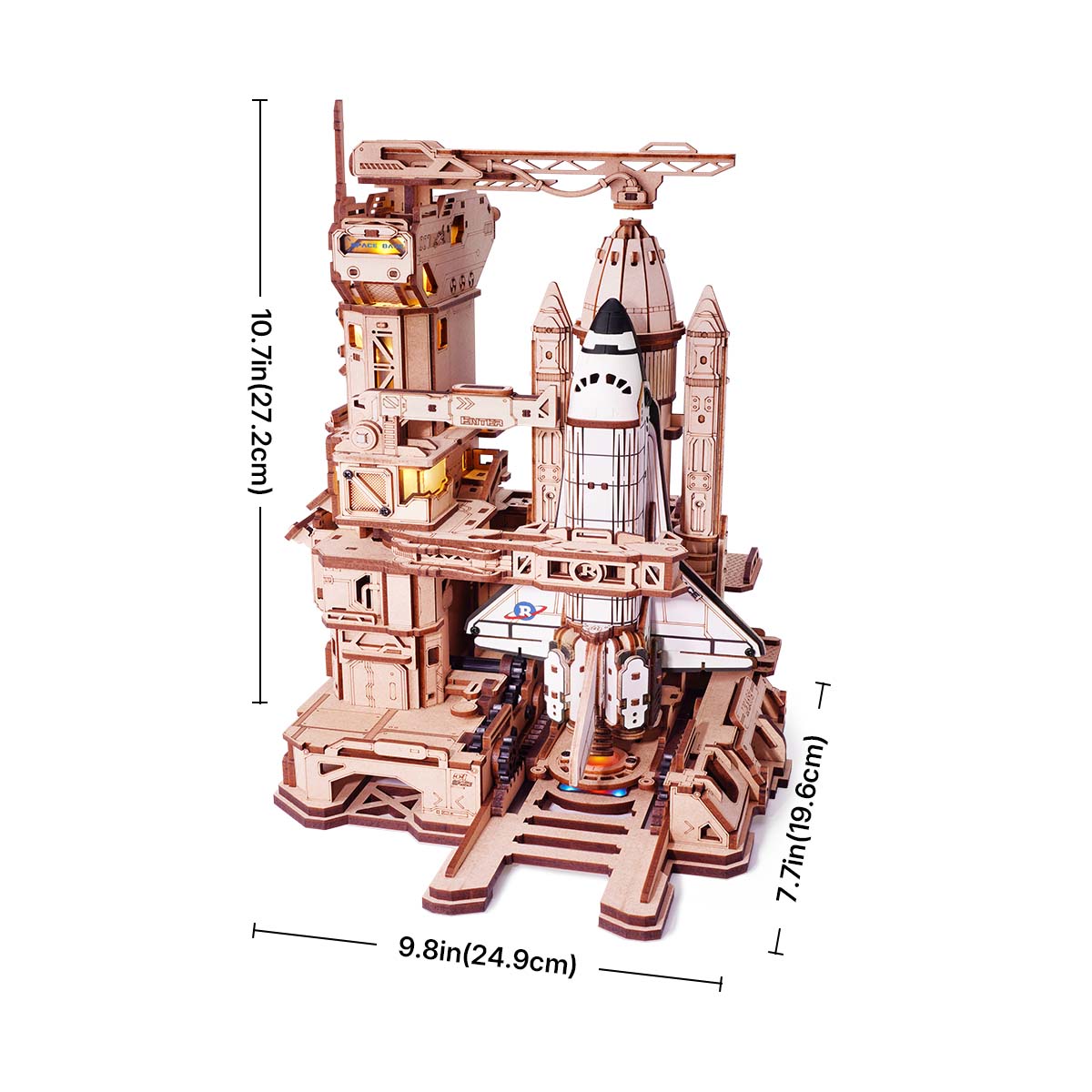 Wooden model kit of a rocket launch tower with measurements on a white background