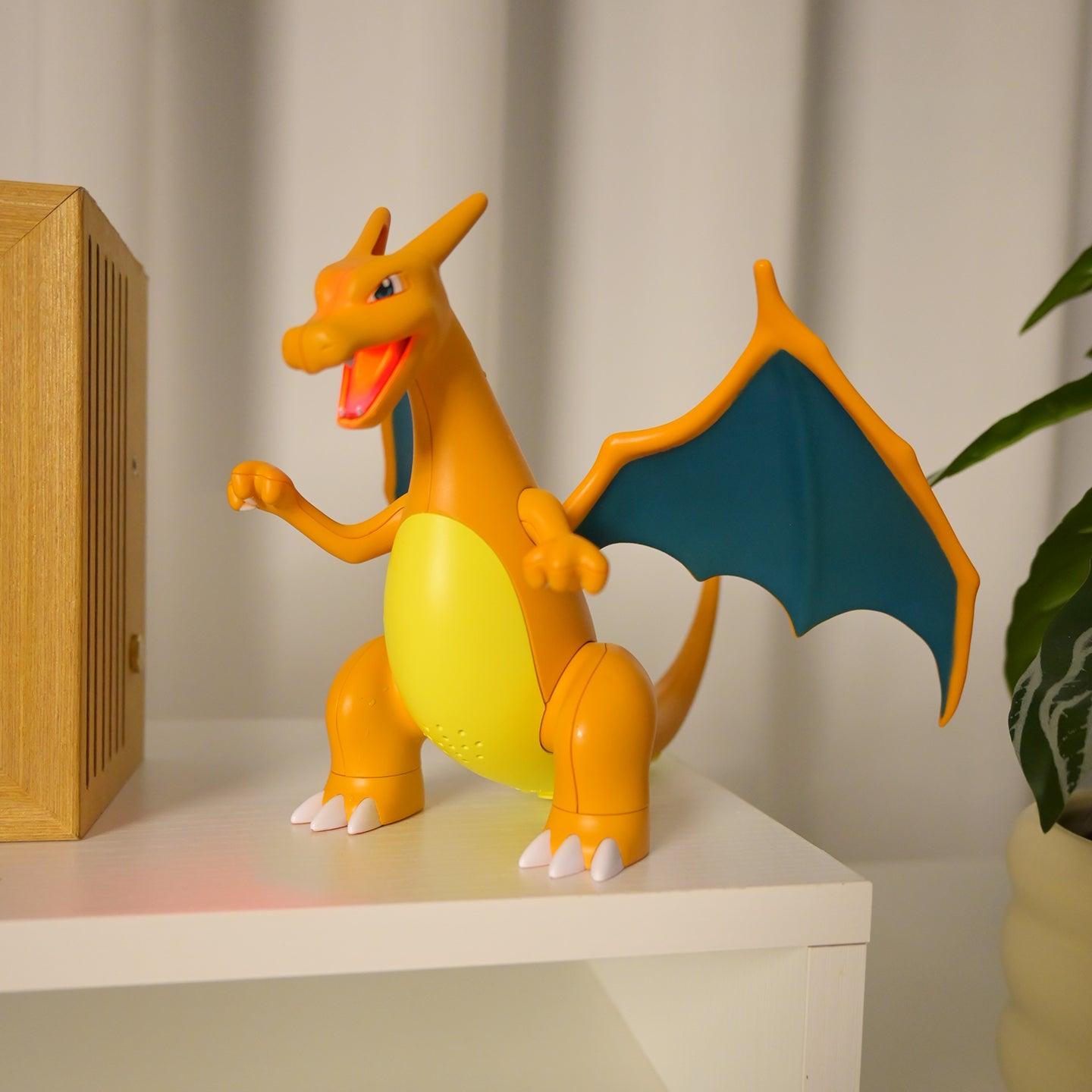 Interactive dragon figure toy with fire-breathing spray effects and LED lighting