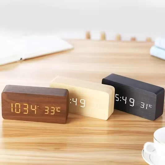 wood grain desk clock lineup showing four finish options with led digits for bedroom and office use Brown, Bamboo, Black, White