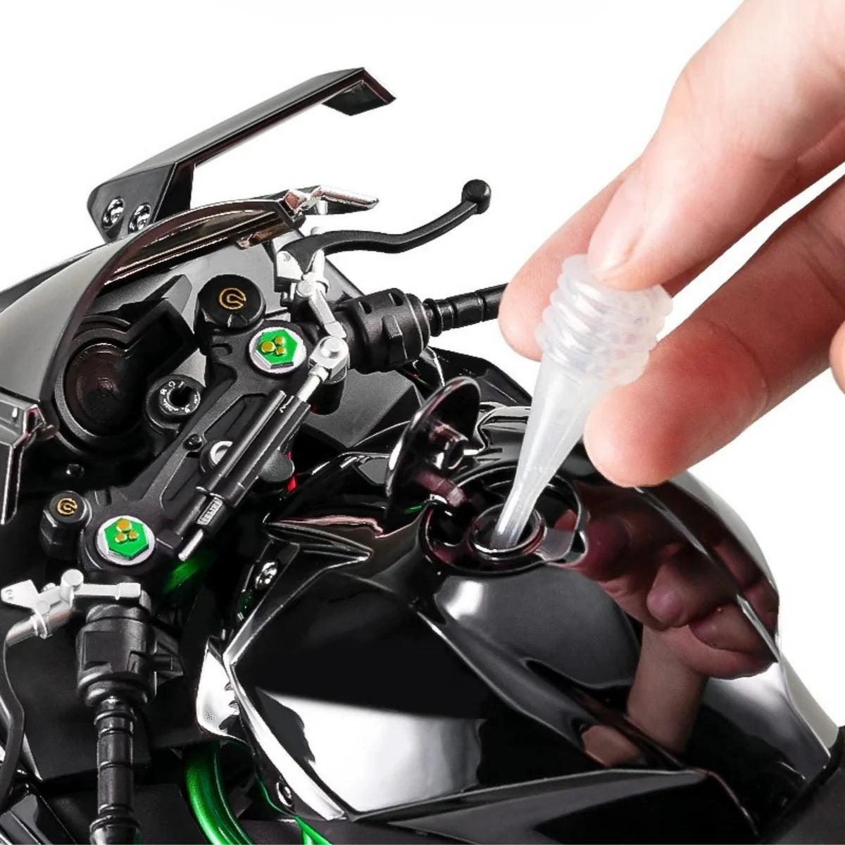 Fuel tank water injection port for exhaust smoke effect on Black and Gold RC superbike models