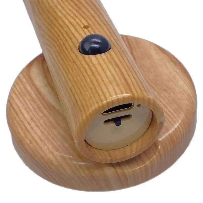 Wooden handle with a central circular component on a white background