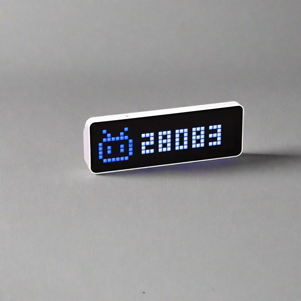 Smart pixel clock followers counter display with LED screen showing social media data, weather, and time