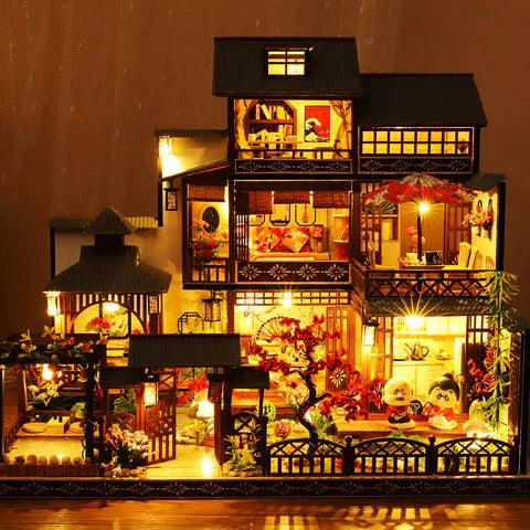 japanese miniature house kit with led lighting showing two storey rooms open balconies and tiled roofs