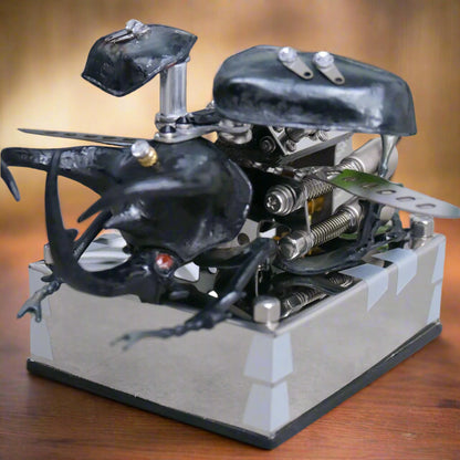 Close-up of a mechanical beetle model with visible components on a neutral background, Puzzloria mechanical model kit DIY assembly engineering educational toy