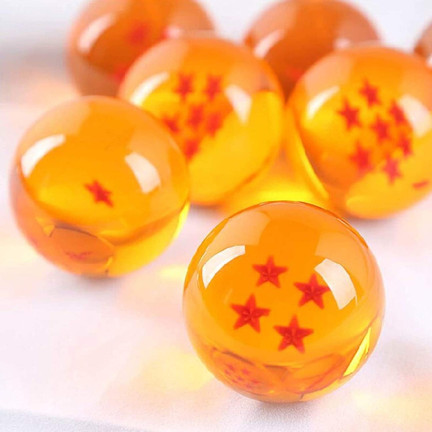 Dragon Ball Z crystal orbs collectible set with star patterns in orange red and blue colors