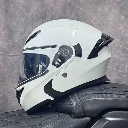 White motorcycle helmet with black accents on a textured gray background