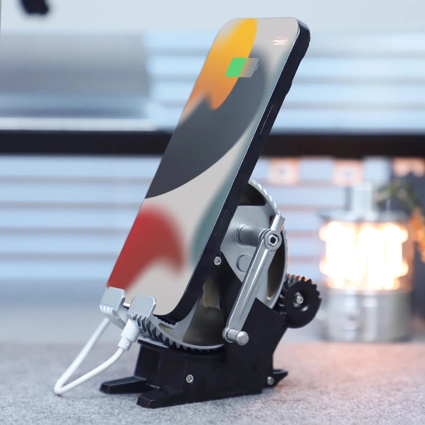 Premium mechanical phone holder with precision engineering and zinc alloy construction for mobile devices by Puzzloria