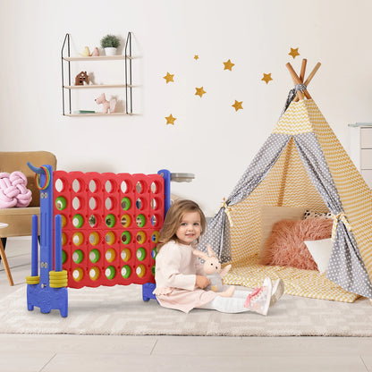 Child playing with a colorful game set in a room with a teepee and star decorations.
