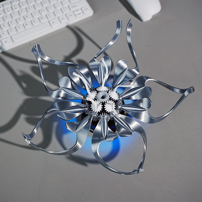 Puzzloria metal flower sculpture with mechanical gears and curved steel petals for steampunk desk decor