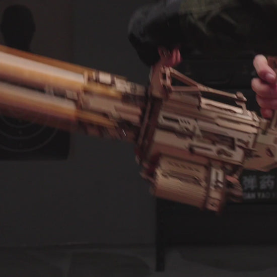 Rotating barrel wooden puzzle gun kit 3D assembly model with 6-barrel firing mechanism by Puzzloria