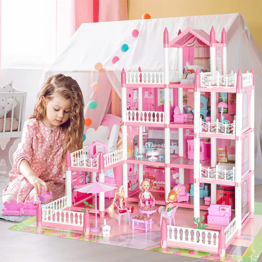 Child playing with a pink dollhouse and dolls in a room.