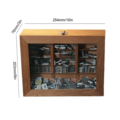 anxiety bookshelf shaken state with mini books scattered at the base showing the tactile reset and fidget mechanism