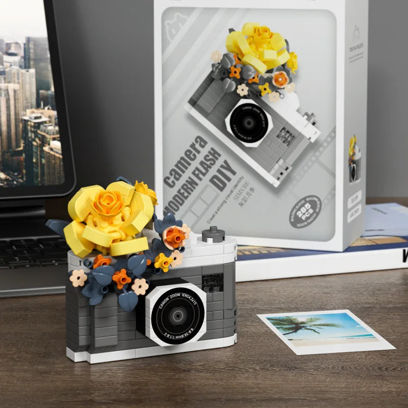grey retro camera micro building block model with golden brick roses, flower ornament for a photographer, Grey