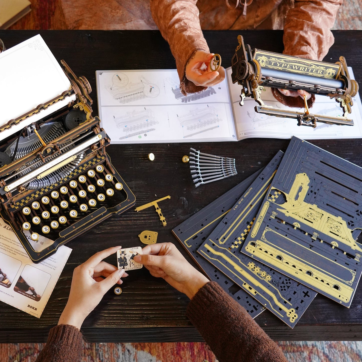 3d wooden typewriter puzzle assembly in progress, laser cut piece mechanical model kit diy adult craft project