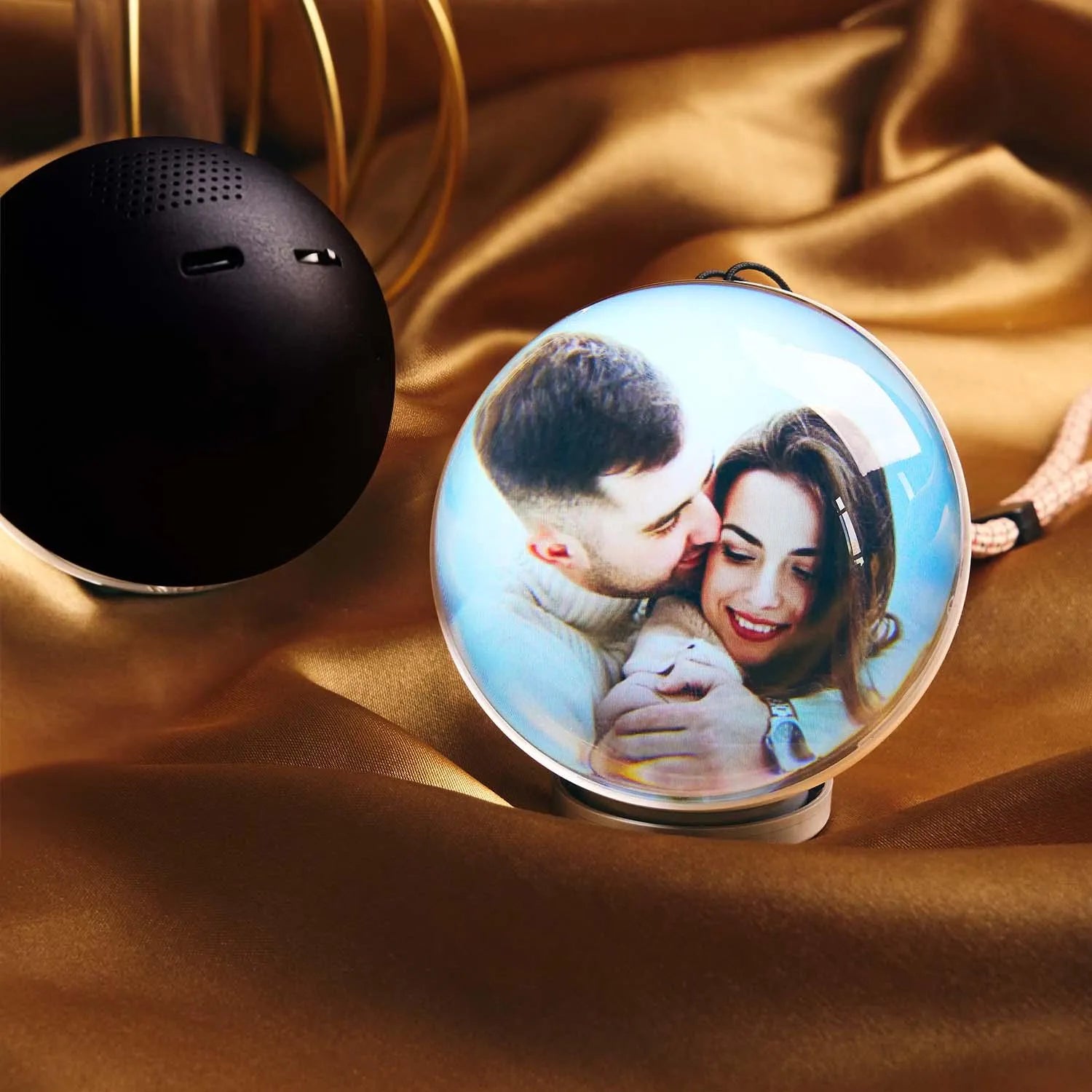 Custom video crystal ball memory orb with LED light base displaying 3D photos and videos