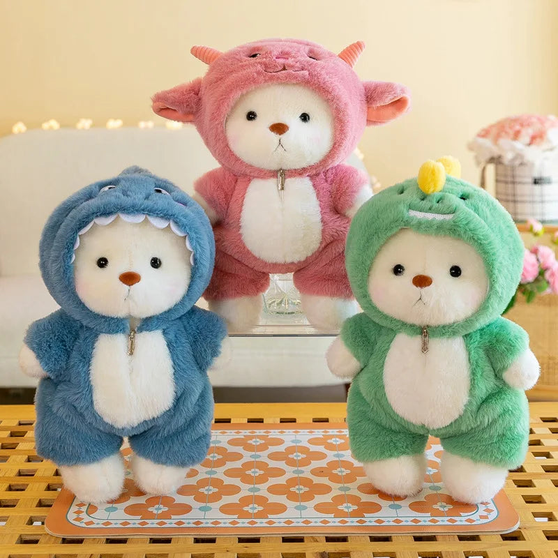 Three plush toys in animal costumes on a decorative stand with a floral pattern.