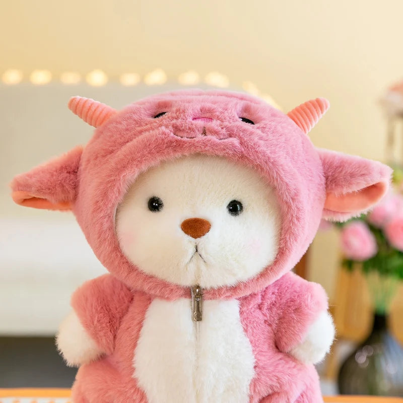 Plush toy in a pink animal costume with a blurred background