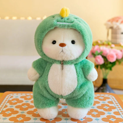 Plush toy in a green dinosaur costume on a floral tablecloth