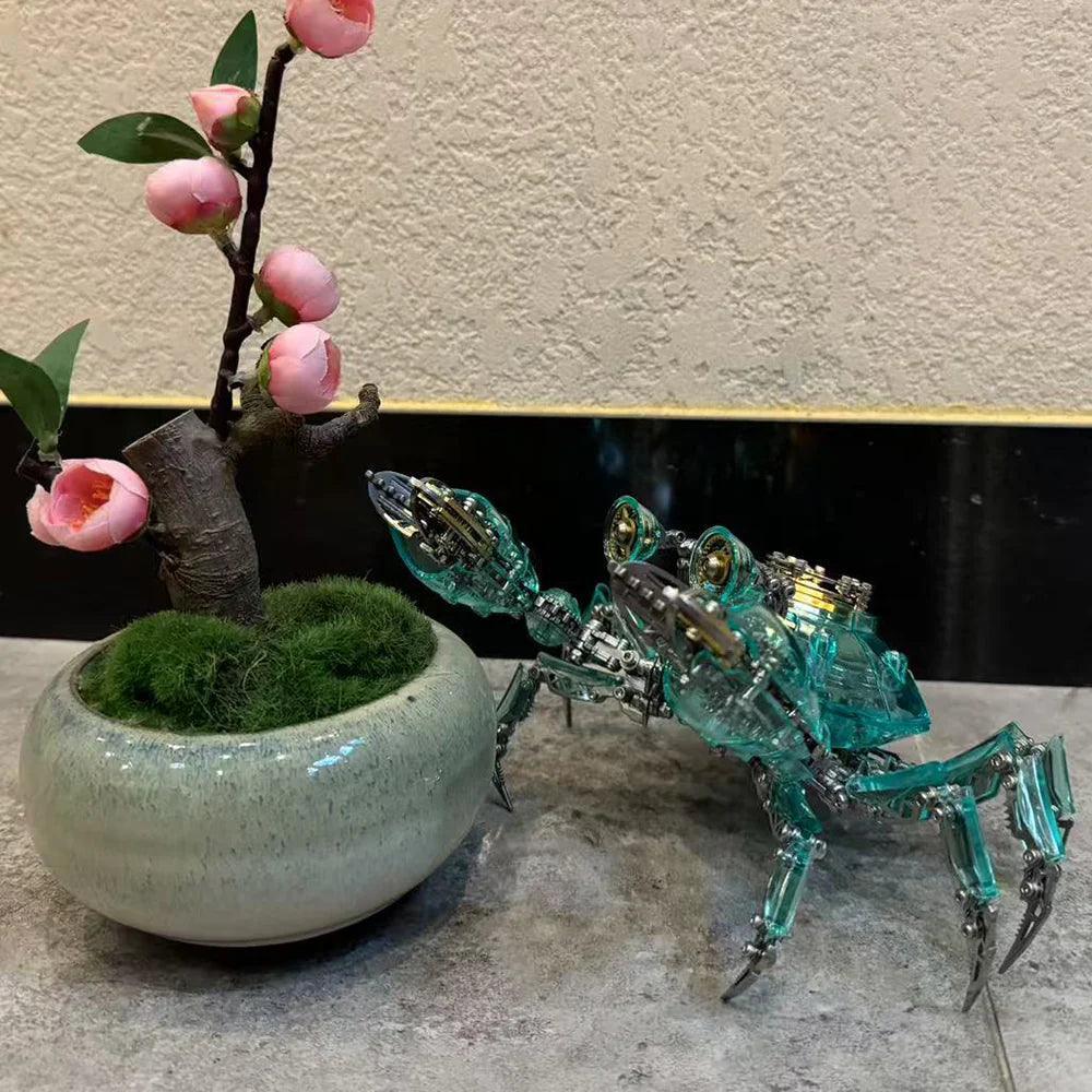 finished metal crab sculpture beside a bonsai planter as home office decor and a birthday gift for model fans, Green