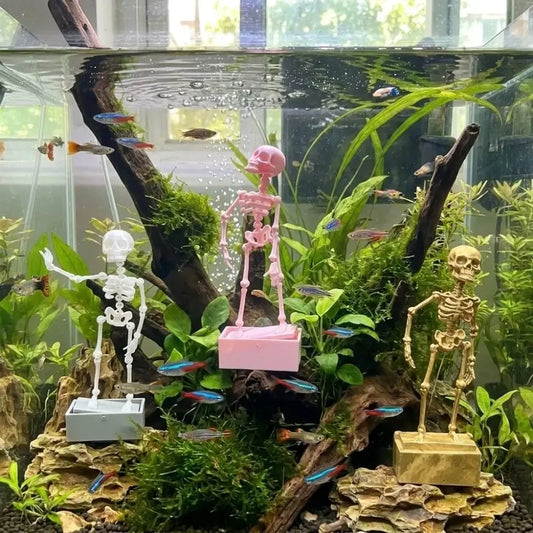 dancing skeleton aquarium bubbler moving fish tank decoration standing in a planted aquascape with neon tetras