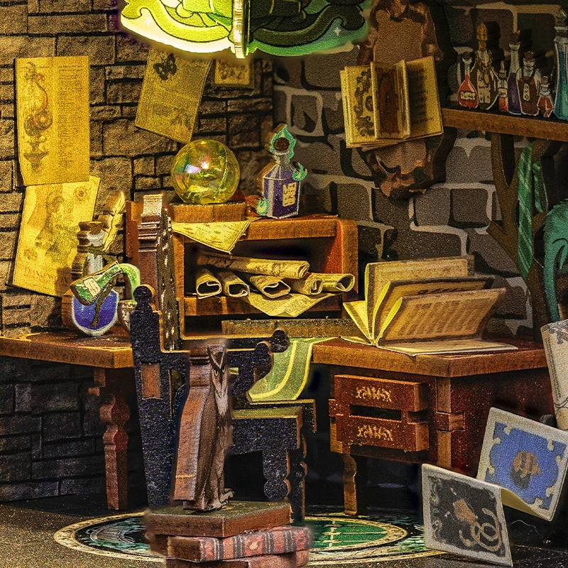 Detailed diorama of a wizard's desk with books, potions, and magical items.
