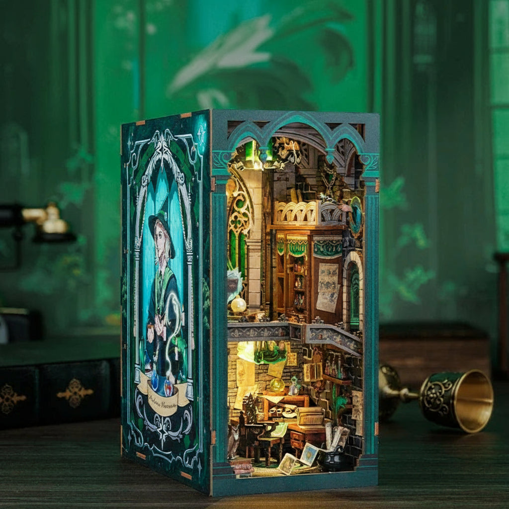 DIY book nook model with intricate details on a green background
