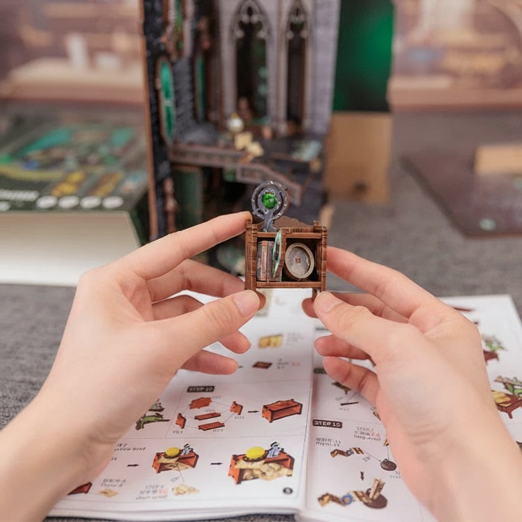 Hands assembling a small wooden model with an instruction manual in the background, featuring the text 'Easy Assembly'.