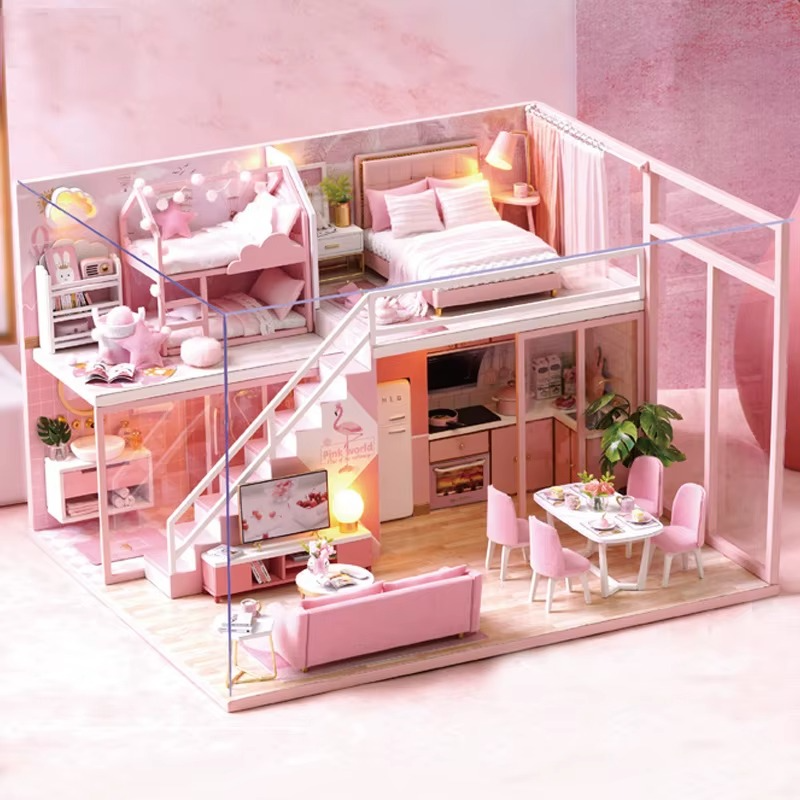 DIY Dollhouse Kit (Apartment) Pink dollhouse with furniture inside a glass display case.
