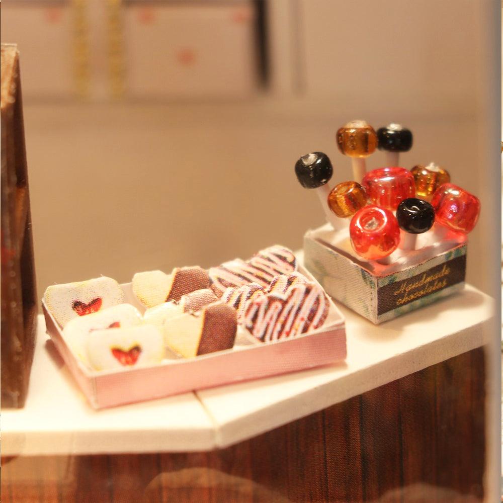 diy miniature kit with tiny chocolates cake stands and gift bags 1:24 scale room box hobby build for adults