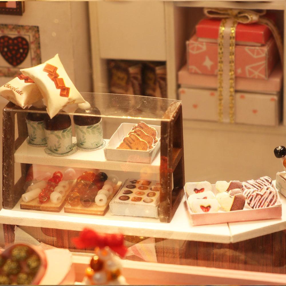 wooden miniature house kit intermediate craft project lit chocolate shop for a shelf or desk display piece