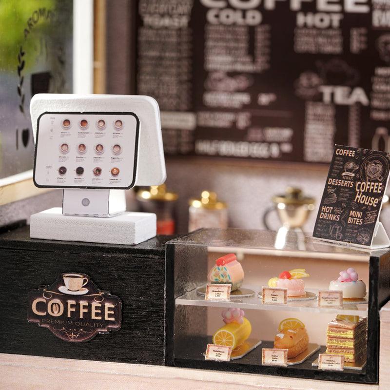 diy miniature kit with tiny cakes pastry case and coffee signage 1:24 scale room box hobby build for adults