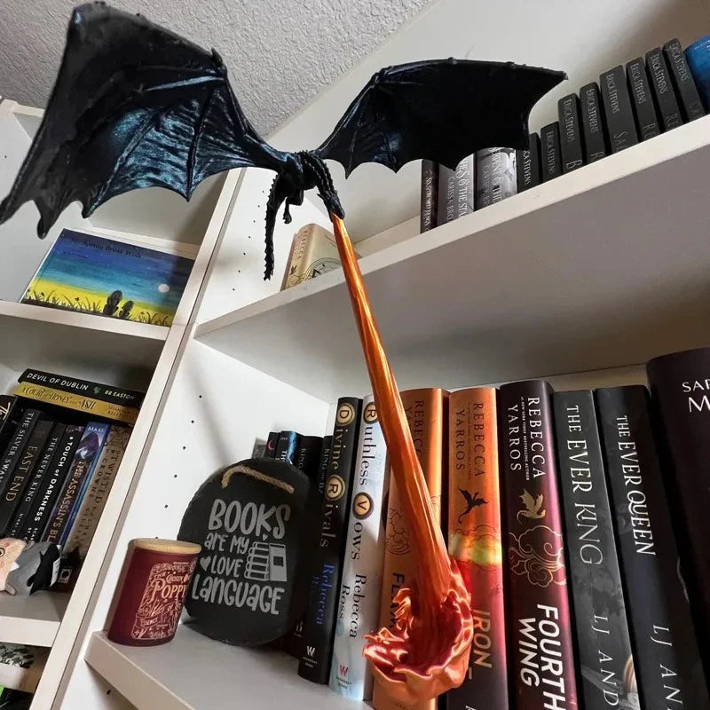 winged dragon shelf ornament breathing fire down a home library bookcase, halloween decor and christmas gift idea