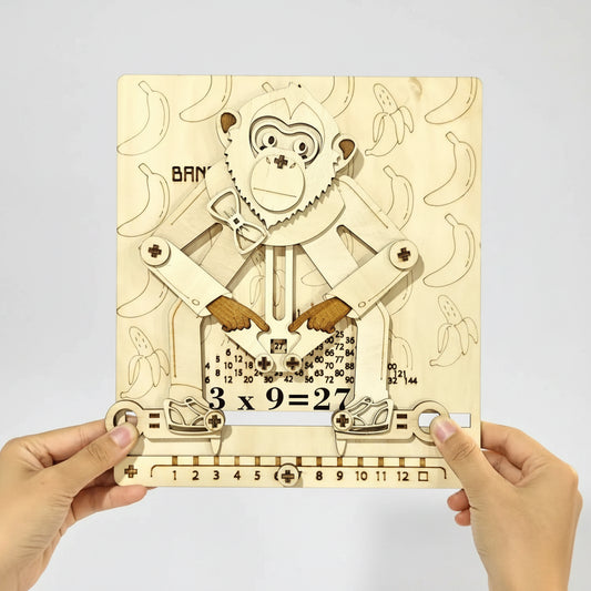 wooden educated monkey multiplication calculator puzzle held in hand 3x9 hands-on math learning gift for homeschool teacher