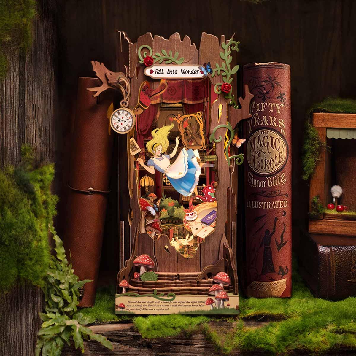 illuminated wooden book nook used as a bookend beside a vintage novel, fantasy home decor for a study shelf