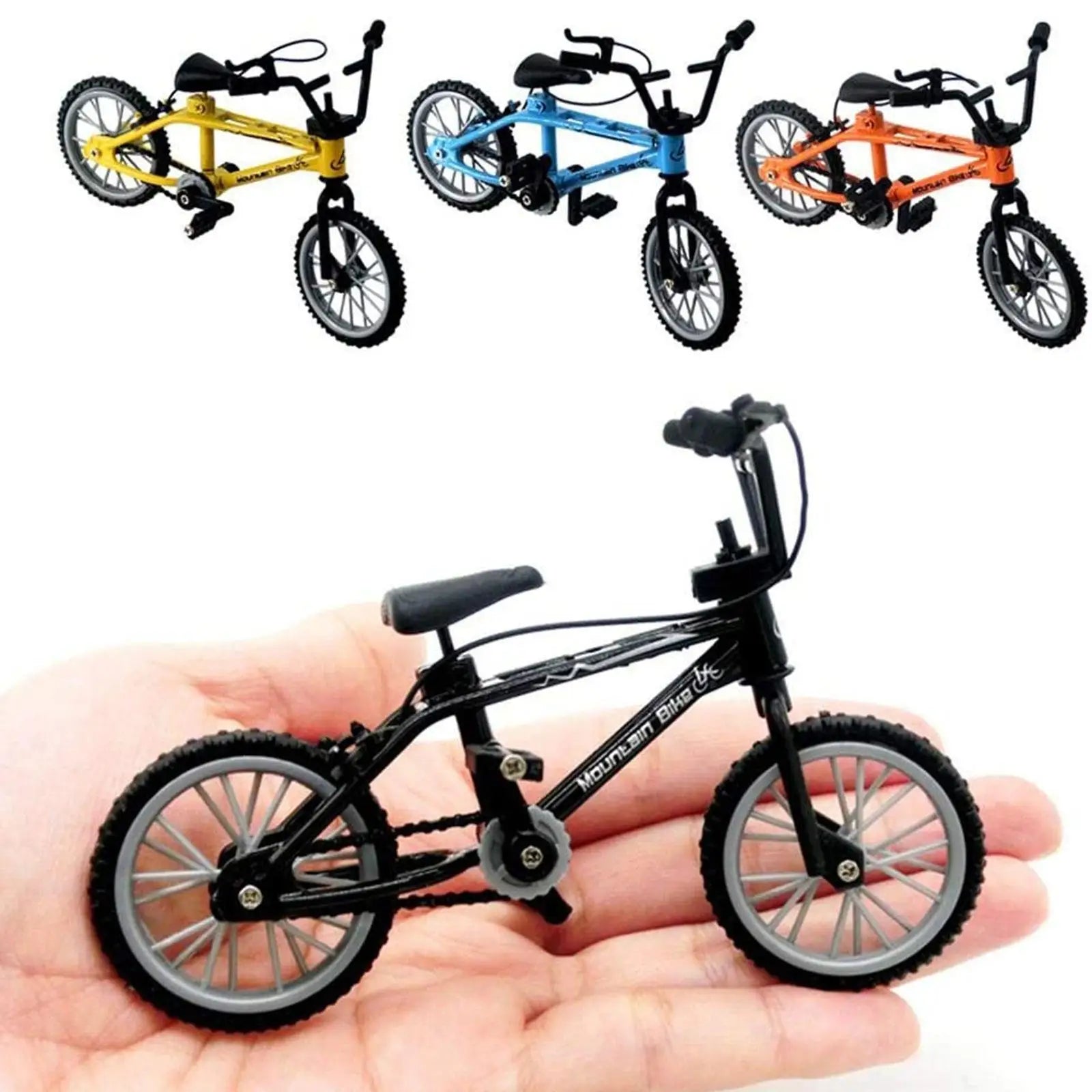 Set of miniature finger bikes in different colors held in a hand.