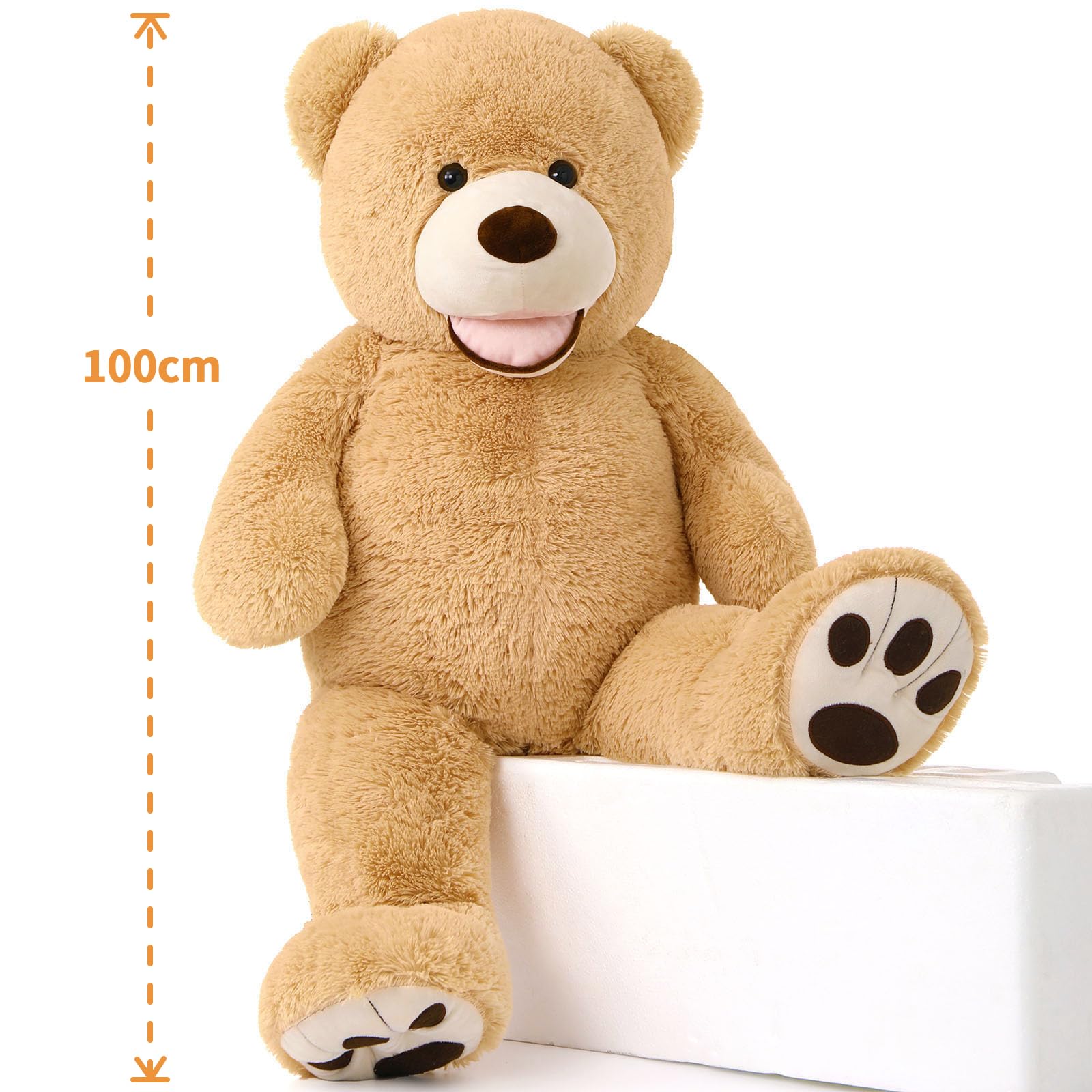 Large teddy bear with a measurement indicator showing its height.