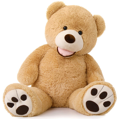 Plush teddy bear with paw prints on paws and a happy expression on a white background