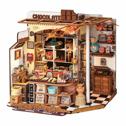 henrys chocolate diy miniature house kit assembled as a lit 1:18 scale chocolate shop for shelf display