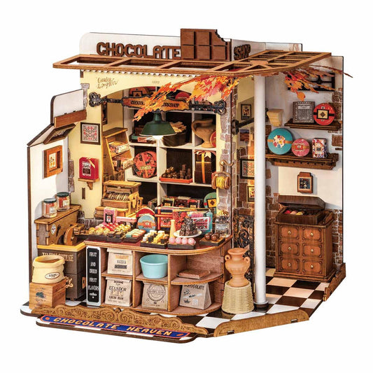 henrys chocolate diy miniature house kit assembled as a lit 1:18 scale chocolate shop for shelf display